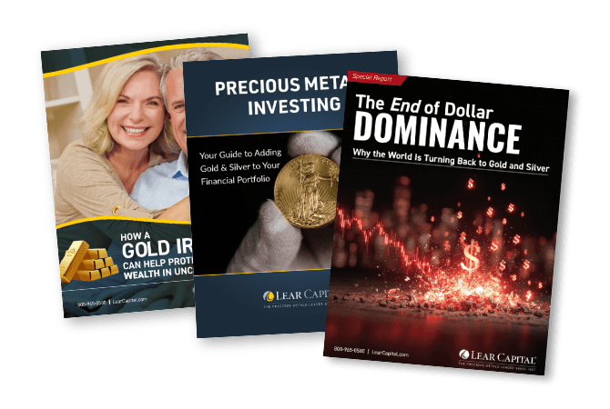 Fanned collection  of IRA Guide, Precious Metals Investing and The End of Dollar Dominance report covers
